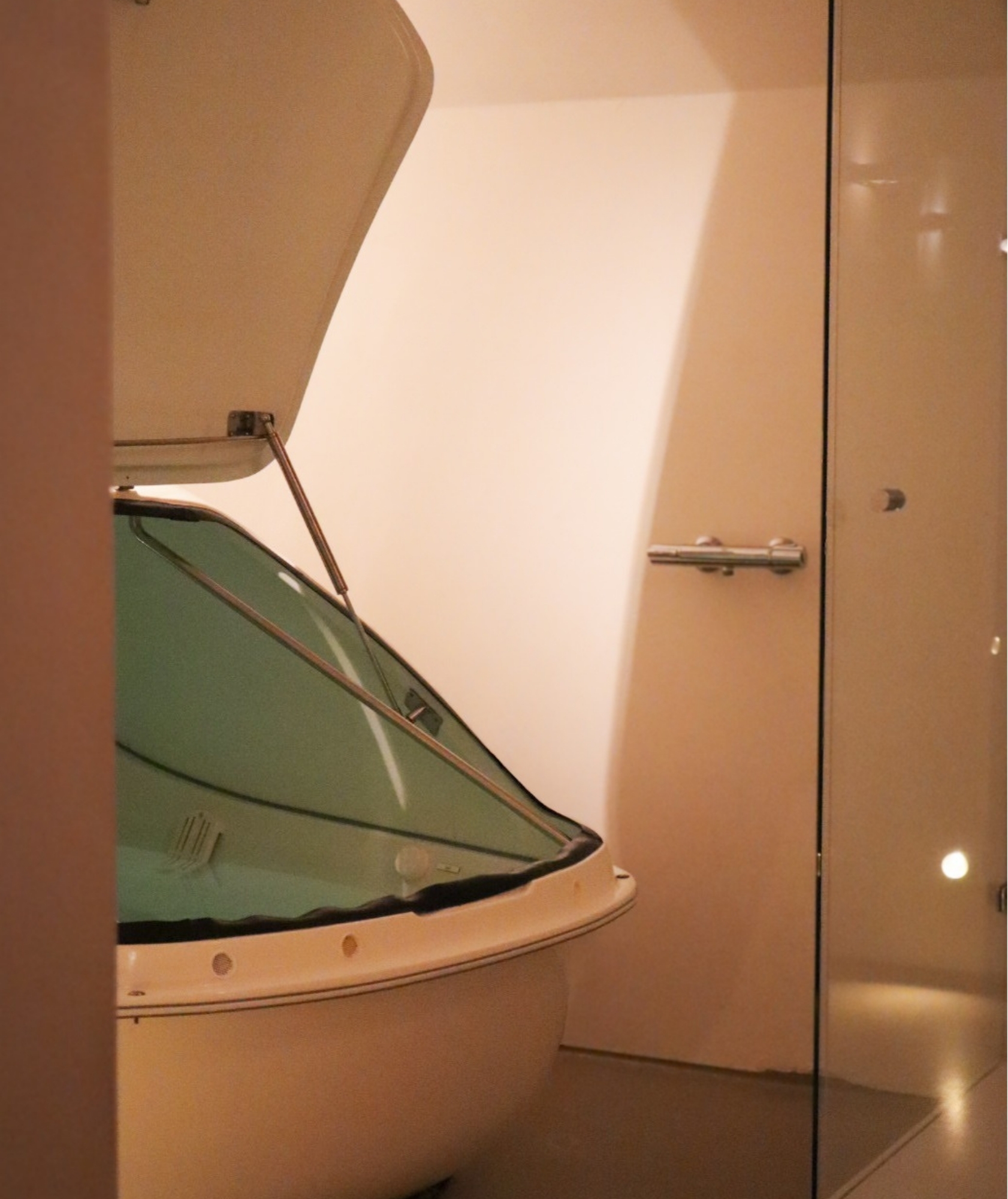 Modern float cabin filled with warm Epsom saltwater at Koan Float Amsterdam spa